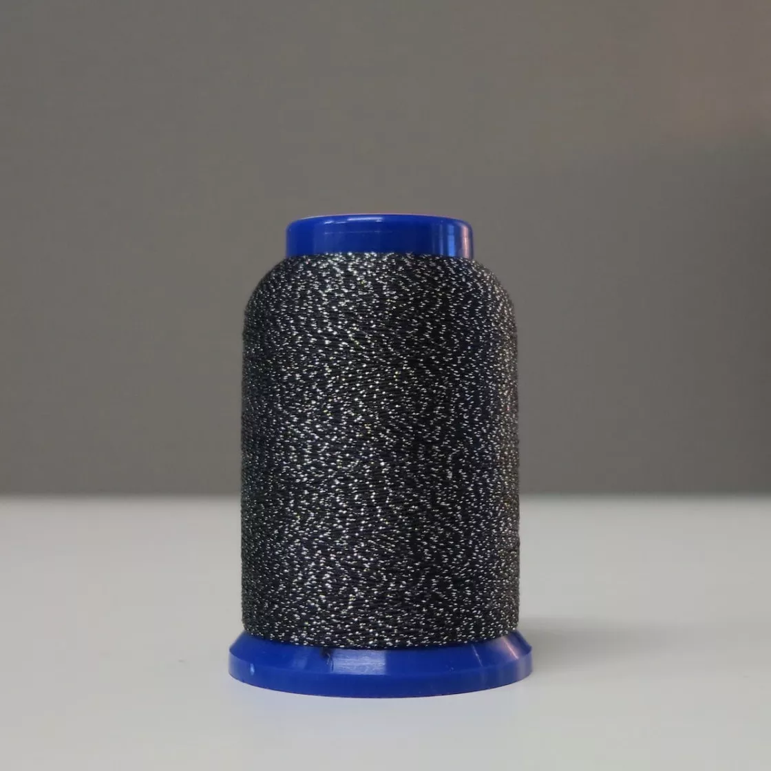 Woollie Lock Lame 502 – overlocktråd med glitter